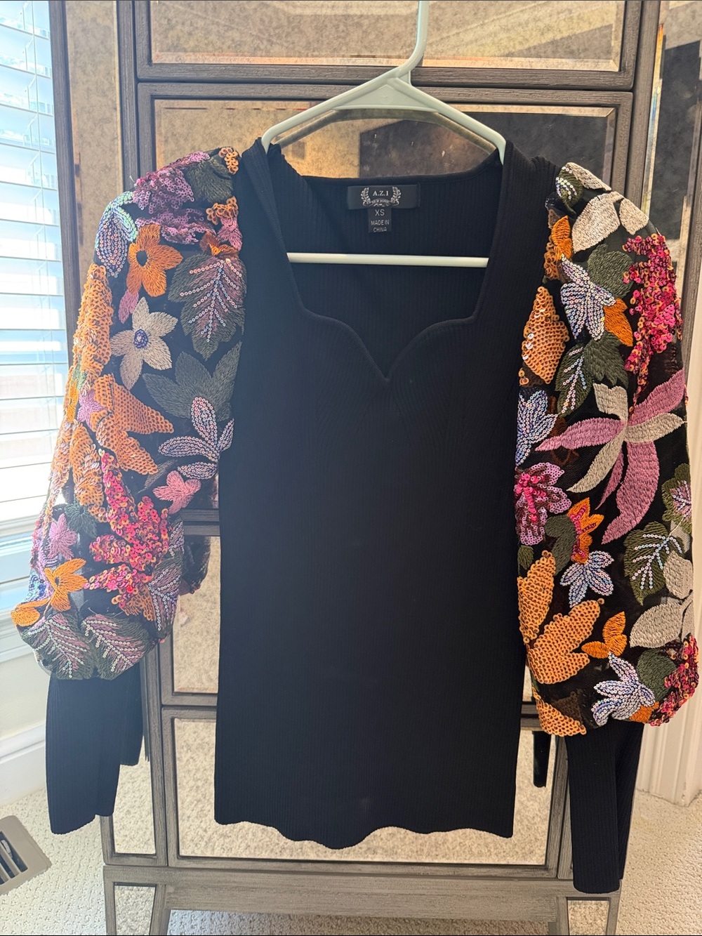 AZZ  Black Ribbed Sweater with Colorful Floral Sequin Puff Sleeves